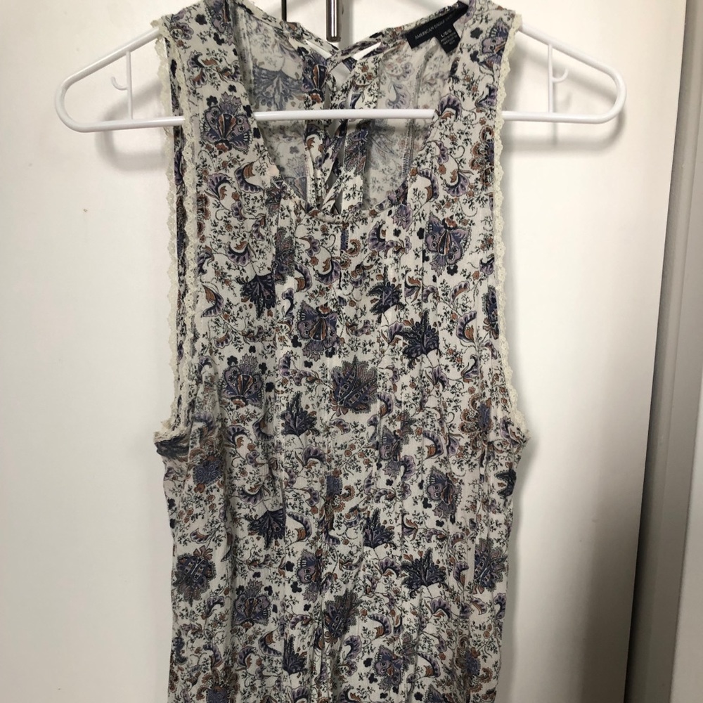 Long sleeveless blouse